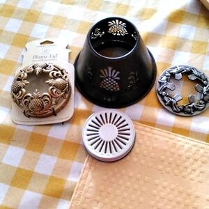 Gold and Brown Candle Holders with Intricate Accents